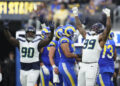 Seattle Seahawks defensive end Leonard Williams (99) celebrates after sacking Los Angeles Rams quarterback Jimmy Garoppolo during the second half of an NFL football game Sunday, Jan. 5, 2025, in Inglewood, Calif. (AP Photo/Eric Thayer)