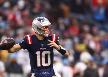 Drake Maye of the New England Patriots throws a pass against the Los Angeles Chargers at Gillette Stadium on December 28, 2024 in Foxborough, Massachusetts.