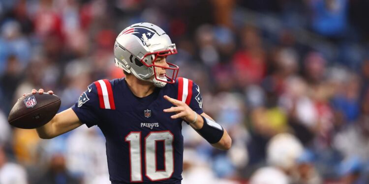 Drake Maye of the New England Patriots throws a pass against the Los Angeles Chargers at Gillette Stadium on December 28, 2024 in Foxborough, Massachusetts.