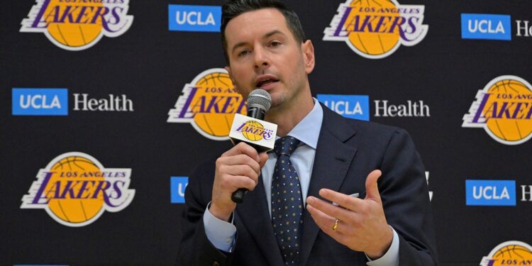 JJ Redick speaks on microphone