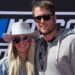 Kelly and Matthew Stafford at a NASCAR race