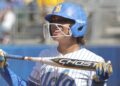 Maya Brady smiles with helmet on