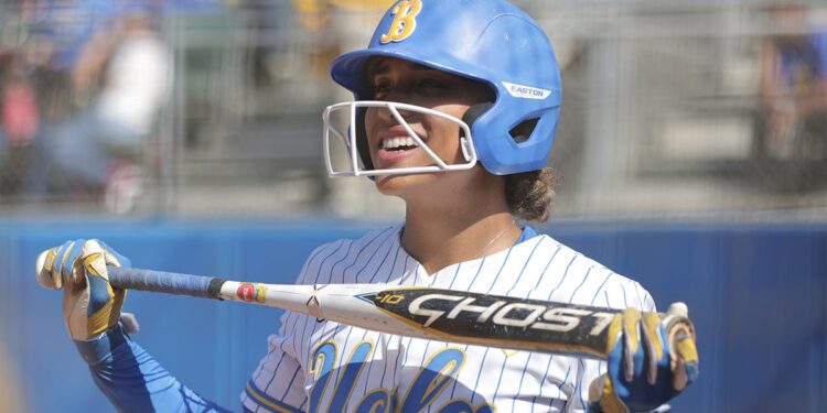 Maya Brady smiles with helmet on