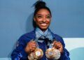 Simone Biles with her medals