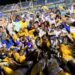 Miami Northwestern's team poses for a photo following their victory over Raines in the Class 3A state championship at Florida International University on Dec. 14, 2024.