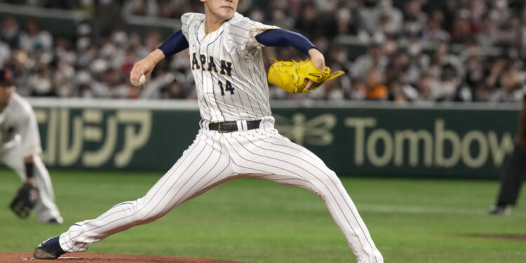 Between his young age, immense talent and low price, Roki Sasaki is a bargain unlike anything we've seen in baseball, outside of Shohei Ohtani. (AP Photo/Eugene Hoshiko, File)