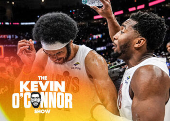 Cleveland Cavaliers players Jarett Allen and Donovan Mitchell celebrate after their team's Wednesday night victory against the Oklahoma City Thunder. (AP Photo/Sue Ogrocki)