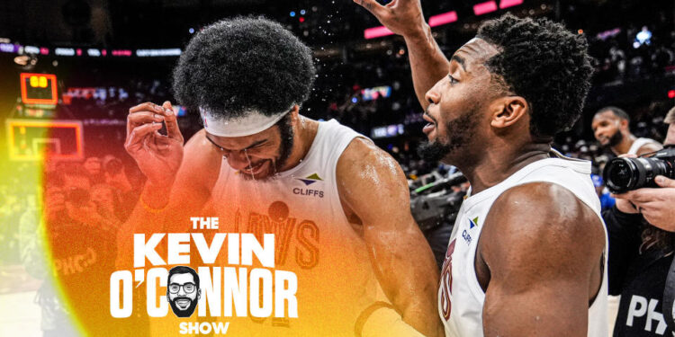 Cleveland Cavaliers players Jarett Allen and Donovan Mitchell celebrate after their team's Wednesday night victory against the Oklahoma City Thunder. (AP Photo/Sue Ogrocki)