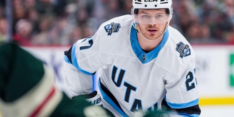 SAINT PAUL , MINNESOTA - JANUARY 23: Barrett Hayton #27 of the Utah Hockey Club before a face-off during the first period against the Minnesota Wild on January 23, 2025 at Xcel Energy Center in Saint Paul, Minnesota.  (Photo by Hunter Dyke/NHLI via Getty Images)