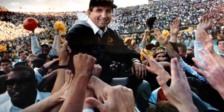 University of Colorado Head Football Coach Bill McCartney is carried off the field after a win against Nebraska in the 1989 season.(Photo by Cliff Grassmick/Digital First Media/Boulder Daily Camera via Getty Images)