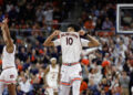 AUBURN, ALABAMA - JANUARY 14: Chad Baker-Mazara #10 of the Auburn Tigers reacts after shooting a three-pointer during the first half against the Mississippi State Bulldogs at Neville Arena on January 14, 2025 in Auburn, Alabama. (Photo by Stew Milne/Getty Images)