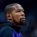 DENVER, COLORADO - DECEMBER 23: Kevin Durant #35 of the Phoenix Suns looks on before a game against the Denver Nuggets at Ball Arena on December 23, 2024, 2024 in Denver, Colorado. NOTE TO USER: User expressly acknowledges and agrees that, by downloading and or using this photograph, User is consenting to the terms and conditions of the Getty Images License Agreement. (Photo by Dustin Bradford/Getty Images)