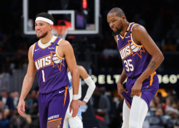 Are the Suns stockpiling assets to upgrade their roster this season around Devin Booker and Kevin Durant? (Photo by Kevin C. Cox/Getty Images)