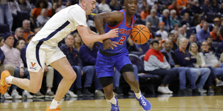 Jan 15, 2025; Charlottesville, Virginia, USA; Southern Methodist Mustangs guard Boopie Miller (2) dribbles the ball as Virginia Cavaliers guard Andrew Rohde (4) defends during the first half at John Paul Jones Arena. Mandatory Credit: Amber Searls-Imagn Images