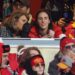 Singer-songwriter Taylor Swift talks with Caitlin Clark of the Indiana Fever during the second half in the AFC Divisional Playoff between the Houston Texans and the Kansas City Chiefs at GEHA Field at Arrowhead Stadium on January 18, 2025 in Kansas City, Missouri. 