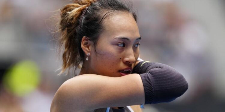 Zheng Qinwen reacts to a point during the Australian Open