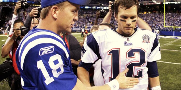 INDIANAPOLIS - NOVEMBER 15:  Quarterback Peyton Manning #18 of the Indianapolis Colts greets Tom Brady #12 of the New England Patriots after the game at Lucas Oil Stadium on November 15, 2009 in Indianapolis, Indiana.  The Colts won the game 35-34. (Photo by Jamie Squire/Getty Images)