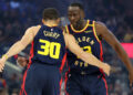 SAN FRANCISCO, CALIFORNIA - NOVEMBER 25: Stephen Curry #30 hugs Draymond Green #23 of the Golden State Warriors before their game against the Brooklyn Nets at Chase Center on November 25, 2024 in San Francisco, California. NOTE TO USER: User expressly acknowledges and agrees that, by downloading and/or using this photograph, user is consenting to the terms and conditions of the Getty Images License Agreement.   (Photo by Ezra Shaw/Getty Images)