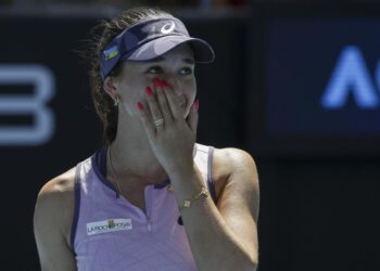 Eva Lys celebrates victory in the Australian Open third round