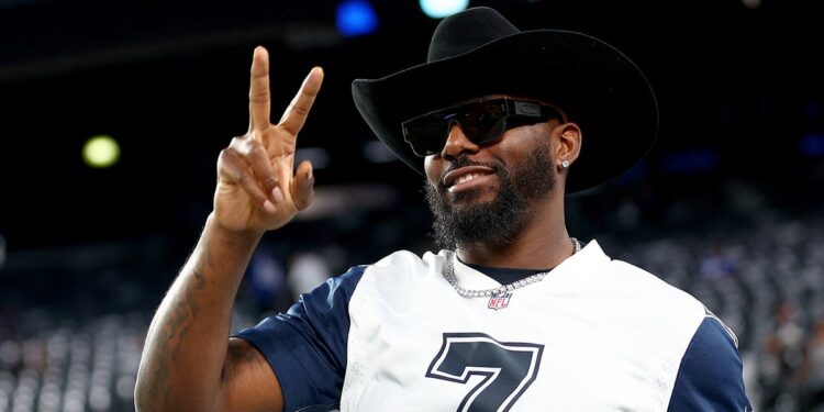 Former Dallas Cowboys wide receiver Dez Bryant walks on the field before the game between the New York Giants and Cowboys, Sept. 26, 2022, in East Rutherford, N.J.