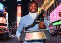 Travis Hunter holds the Heisman Trophy