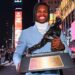 Travis Hunter holds the Heisman Trophy