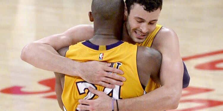 LOS ANGELES, CA - APRIL 13:  Kobe Bryant #24 of the Los Angeles Lakers hugs Larry Nance Jr. #7 after scoring 60 points against the Utah Jazz at Staples Center on April 13, 2016 in Los Angeles, California. Bryant played his last game as a Laker and retired from basketball.  (Photo by Kevork Djansezian/Getty Images)