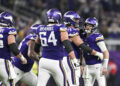 MINNEAPOLIS, MINNESOTA - DECEMBER 29: Quarterback Sam Darnold #14 of the Minnesota Vikings celebrates with Brian O'Neill #75 after a throwing a touchdown pass during the third quarter against the Green Bay Packers at U.S. Bank Stadium on December 29, 2024 in Minneapolis, Minnesota. (Photo by Stephen Maturen/Getty Images)