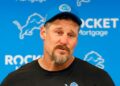 Dan Campbell talks to reporters