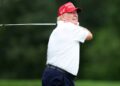 Donald Trump playing golf