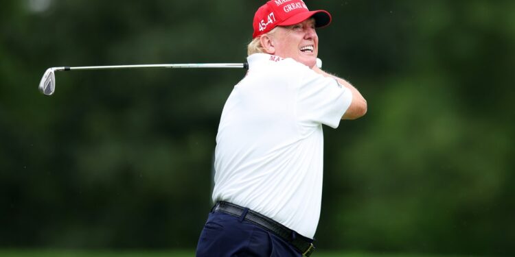 Donald Trump playing golf