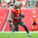 TAMPA, FL - DECEMBER 29: Tampa Bay Buccaneers Running Back Bucky Irving (7) carries the ball during the game between the Carolina Panthers and the Tampa Bay Buccaneers on December 29, 2024 at Raymond James Stadium in Tampa, Florida. (Photo by Cliff Welch/Icon Sportswire via Getty Images)