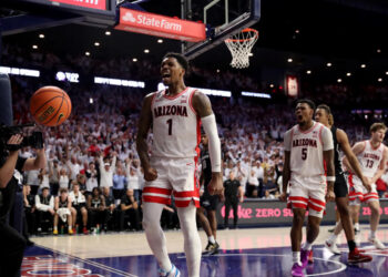 TUCSON, AZ - JANUARY 27: Arizona Wildcats guard Caleb Love #1 celebrates a dunk during the first half of a basketball game between the Iowa State Cyclones and the Arizona Wildcats on January 25, 2025, at McKale Center in Tucson, AZ. (Photo by Christopher Hook/Icon Sportswire via Getty Images)