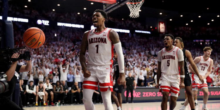 TUCSON, AZ - JANUARY 27: Arizona Wildcats guard Caleb Love #1 celebrates a dunk during the first half of a basketball game between the Iowa State Cyclones and the Arizona Wildcats on January 25, 2025, at McKale Center in Tucson, AZ. (Photo by Christopher Hook/Icon Sportswire via Getty Images)