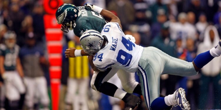 DeMarcus Ware of the Dallas Cowboys sacks Donovan McNabb (5) of the Philadelphia Eagles during the Eagles 10-6 win over the Cowboys at Texas Stadium in Irving, Texas.