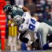 DeMarcus Ware of the Dallas Cowboys sacks Donovan McNabb (5) of the Philadelphia Eagles during the Eagles 10-6 win over the Cowboys at Texas Stadium in Irving, Texas.