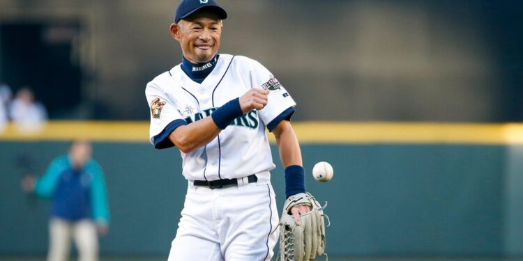 Ichiro Suzuki looks on