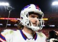 Josh Allen walks on field after loss