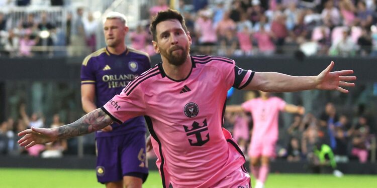 Lionel Messi celebrates after scoring a goal