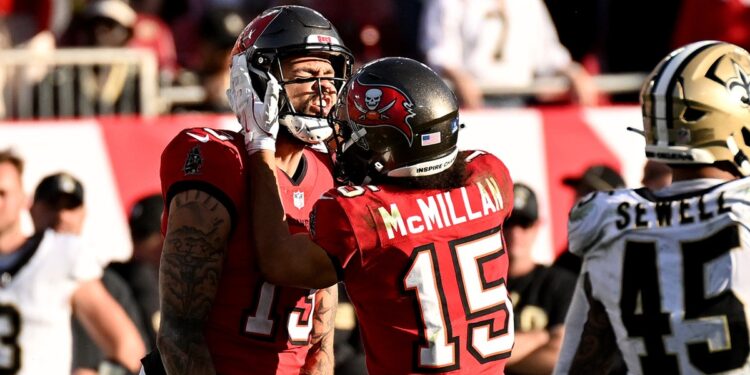 Mike Evans and Jalen McMillan celebrate