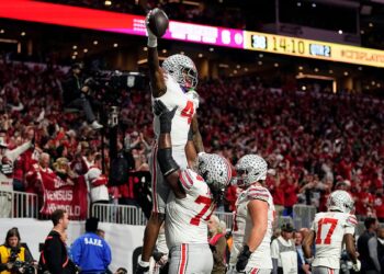 Jeremiah Smith lifted after scoring touchdown