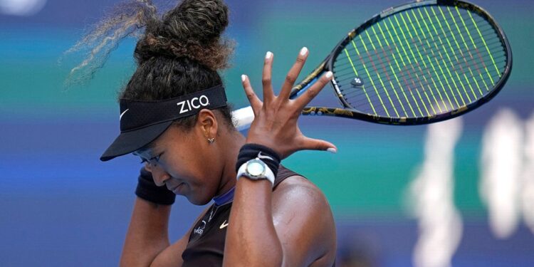 Naomi Osaka reacts