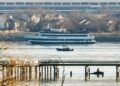 Emergency response units respond to the crash site of an American Airlines plane and Black Hawk helicopter on the Potomac River