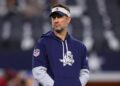 Dallas Cowboys offensive coordinator Brian Schottenheimer looks on prior to the game against the New York Giants at AT&amp;T Stadium on November 28, 2024 in Arlington, Texas. 