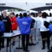 Fans pass through security check points as they enter the Caesars Superdome fan zone ahead of the Sugar Bowl NCAA College Football Playoff game, Thursday, Jan. 2, 2025, in New Orleans. 