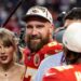 Travis Kelce and Taylor Swift react after a game