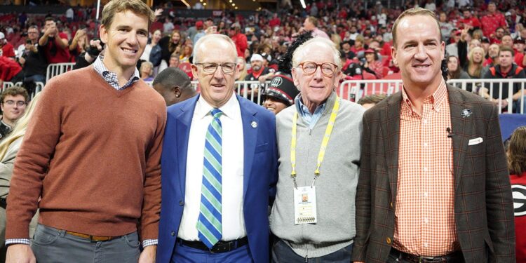 Eli Manning, Greg Sankey, Archie Manning, Peyton Manning pose