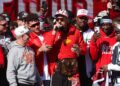 Travis Kelce and his teammates, including Patrick Mahomes celebrate during the Super Bowl Parade 2024