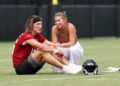 Trevor Lawrence talks with wife