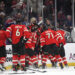 BOSTON, MASSACHUSETTS - FEBRUARY 20: Connor McDavid #97 of Team Canada is mobbed by teammates after scoring the game-winning goal during the first overtime period of the 4 Nations Face-Off Championship game between Team Canada and Team United States at TD Garden on February 20, 2025 in Boston, Massachusetts. (Photo by Brian Babineau/4NFO/World Cup of Hockey via Getty Images)